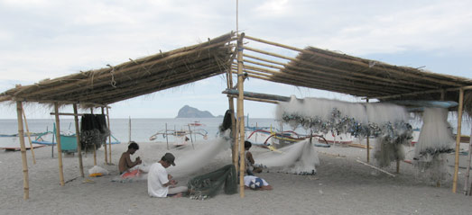 Netzmacher am Strand